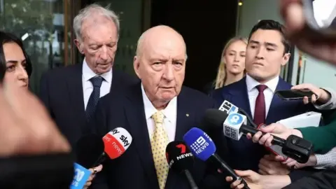 Indecent Assault Allegations Against Prominent Down Under Media Personality Downgraded